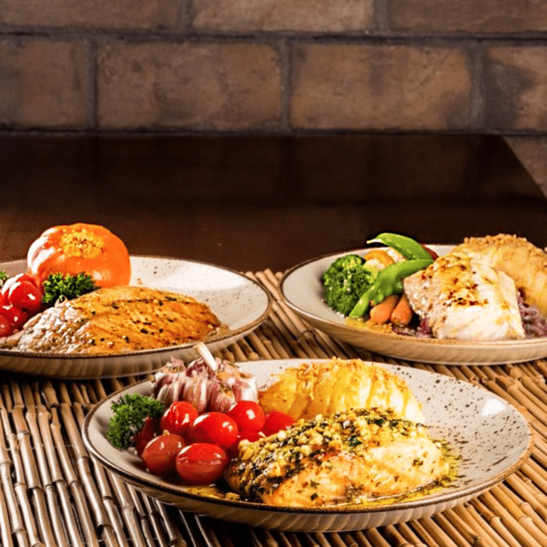 Pratos típicos de comida nordestina. NA imagem: há três pratos diferentes da culinária nordestina do restaurante.